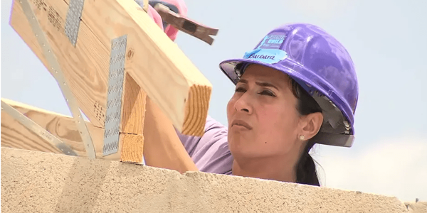 women build home