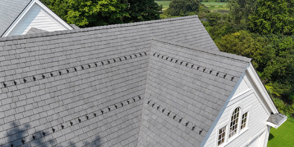 Roof with RMSG Everest Snow Guards retrofitted onto it